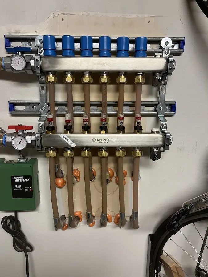 Plumber performing Water Heater Repair at a residential property in Noble